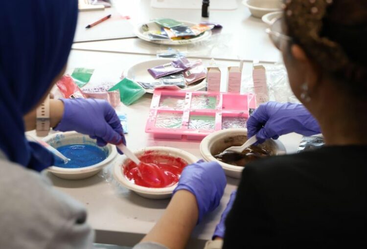 Wednesdays for Women Program Get's Creative? making custom colorful soaps!