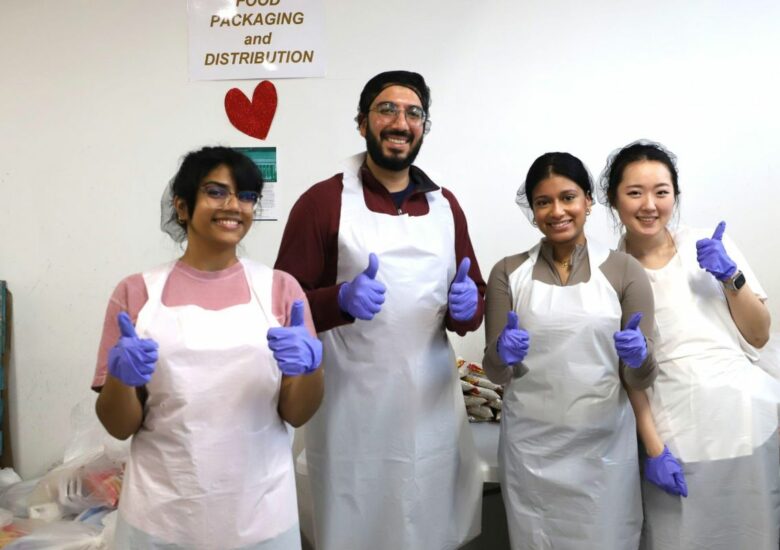 Standard Chartered Bank Volunteers Give Back to the Flushing Community at SACSS Food Pantry