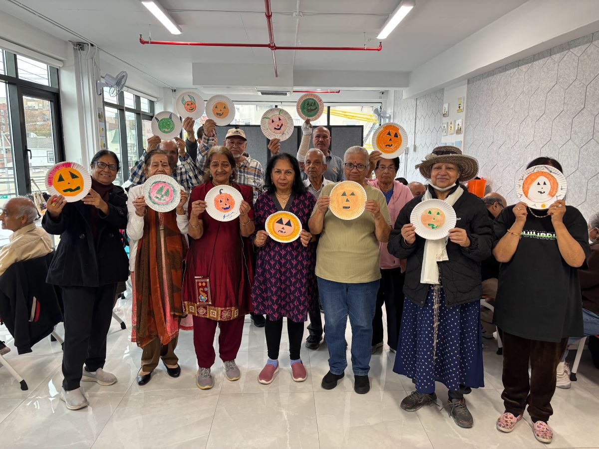 SACSS Seniors Get Creative with Pumpkin Plate Decorating for Halloween